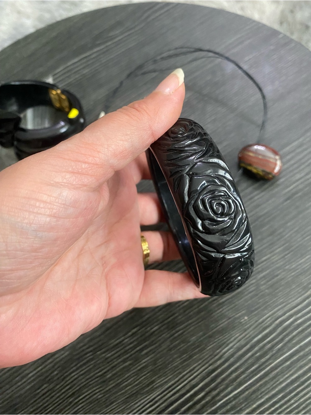 Black Carved Rose Bangle Bracelet might be bakelite vintage